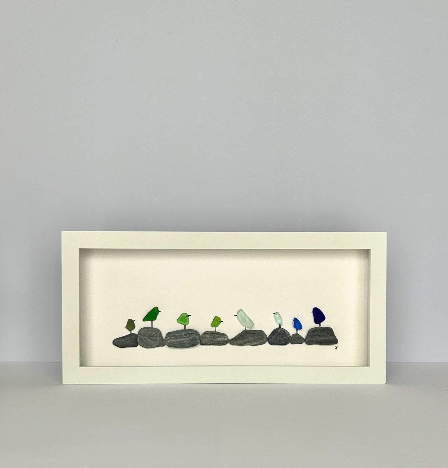 Rainbow Birds on Pebbles