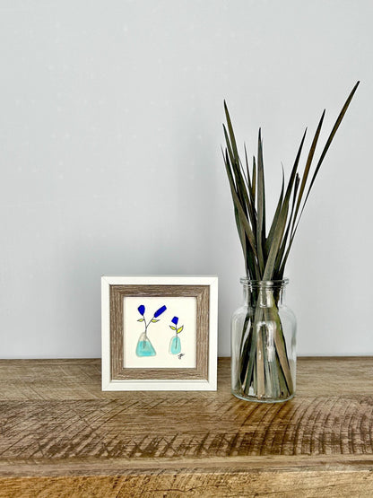 Little Blue Flowers in Vases