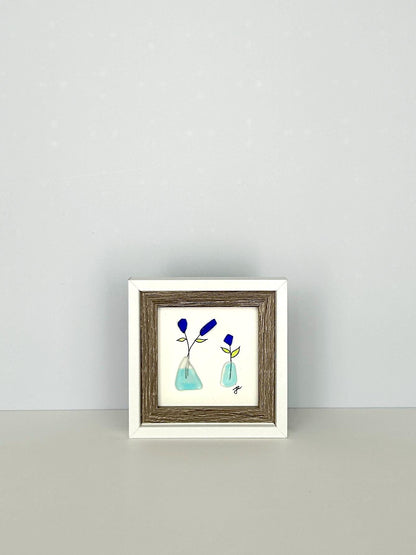 Little Blue Flowers in Vases