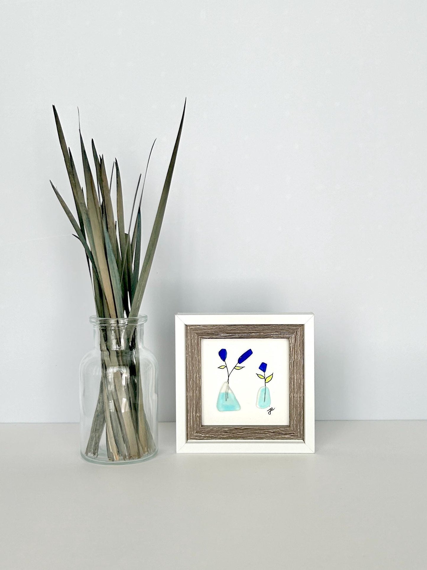 Little Blue Flowers in Vases