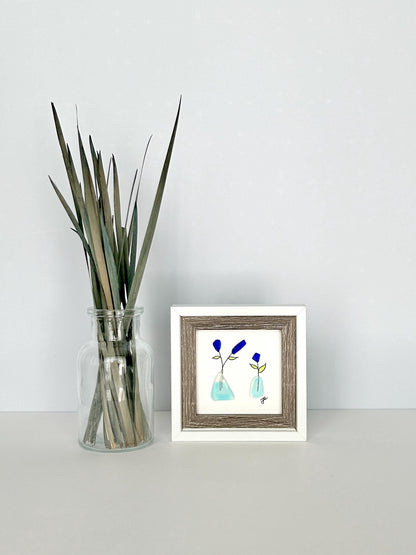 Little Blue Flowers in Vases