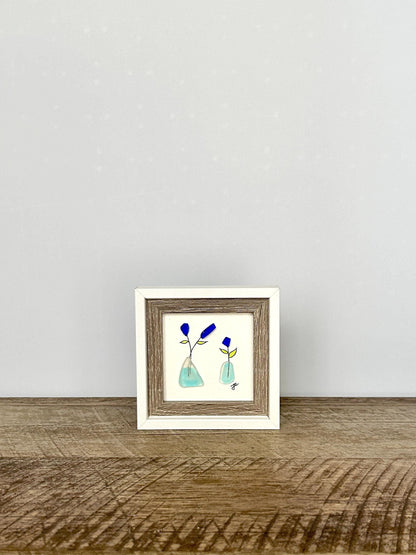 Little Blue Flowers in Vases