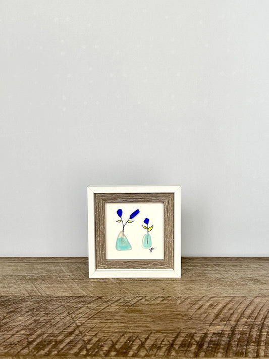 Little Blue Flowers in Vases