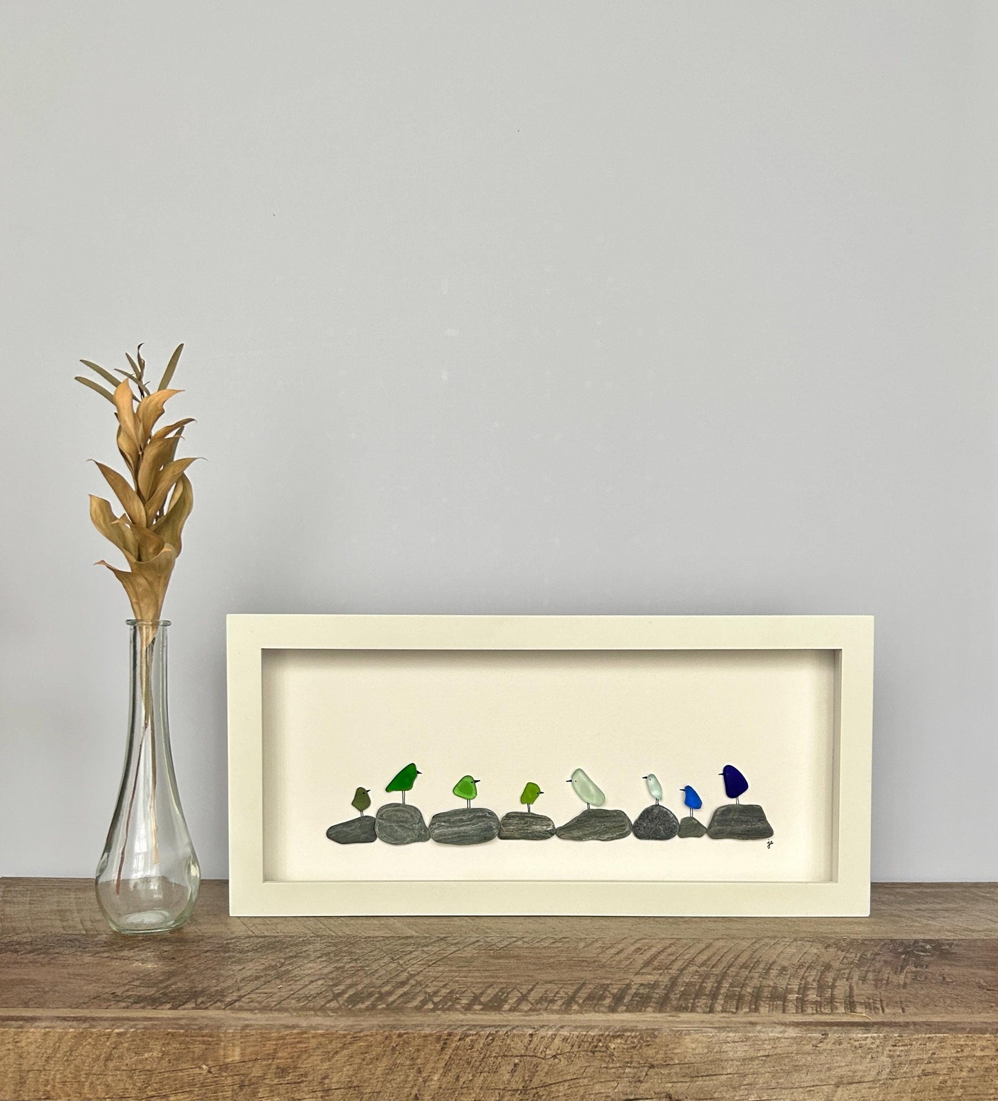 Rainbow Birds on Pebbles